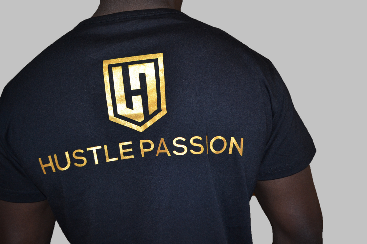 Back view of the black Knowledge T-shirt with large gold H shield logo and Hustle Passion lettering